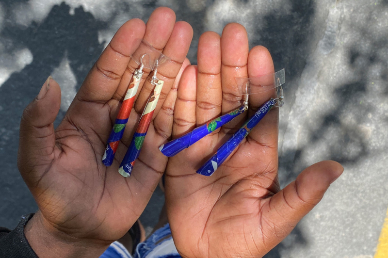 Young Haitians bond over sport, earrings and pineapple jam