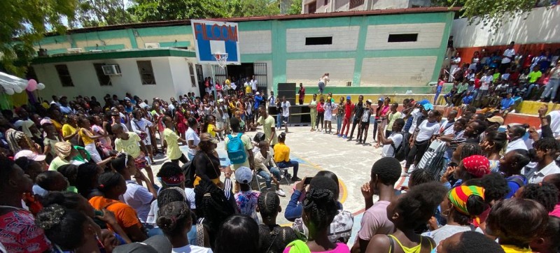 Young Haitians bond over sport, earrings and pineapple jam